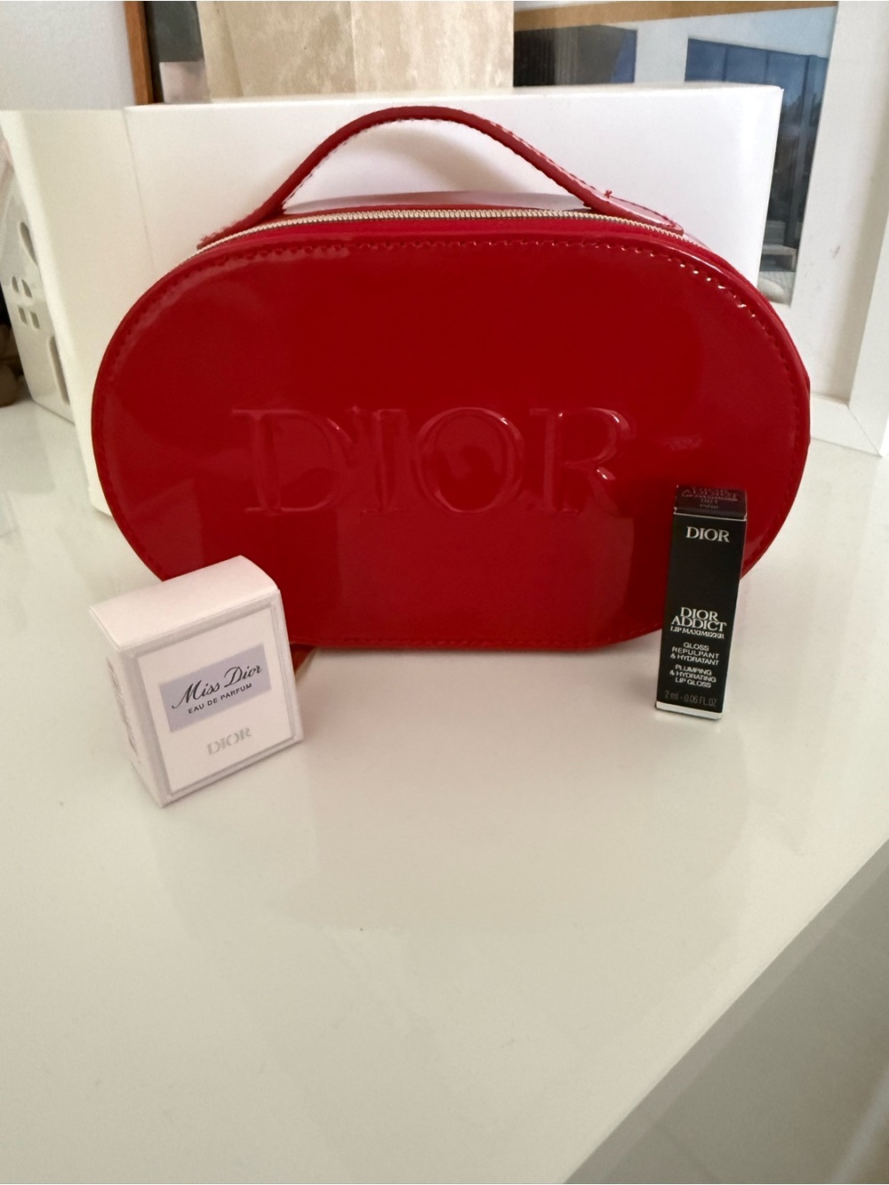 Dior Red Patent Cosmetic Case with travel size accessories